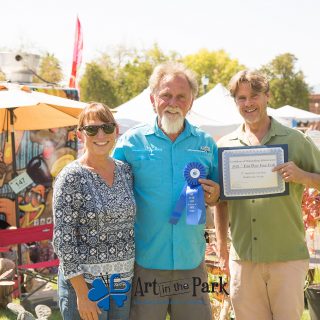 Art in the Park 2021 artist with first place fine craft certificate and ribbon