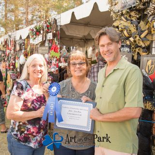 Art in the Park 2021 artist with first place contemporary craft ribbon and certificate