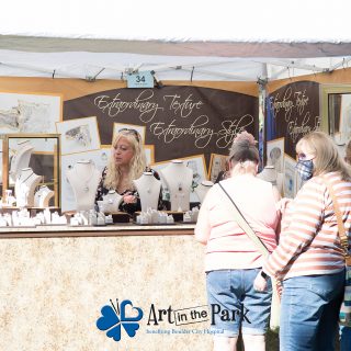 Art in the Park 2021 extraordinary texture extraordinary style event attendees looking at jewelry