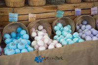 Art in the Park 2021 bins of colorful bath bombs
