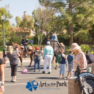 Art in the Park 2021 Boulder city police department on horseback with crowd