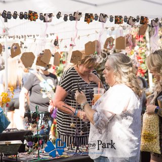 Art in the Park 2021 women looking at jewelry